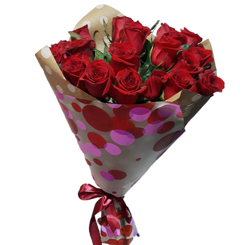 Фото товара 15 красных роз в крафт в Ирпени